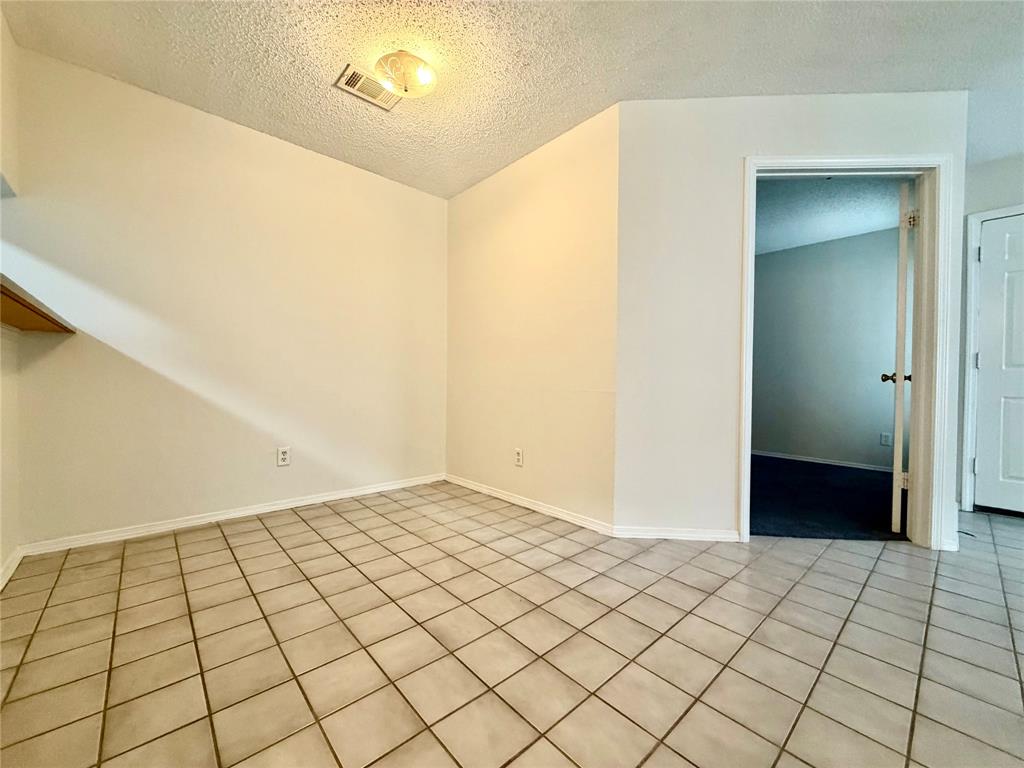 18333 Roehampton Drive, Unit 624 Dallas, TX 75252 - Photo 10 of 39 a view of an empty room