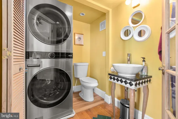 a bathroom with a toilet and a sink