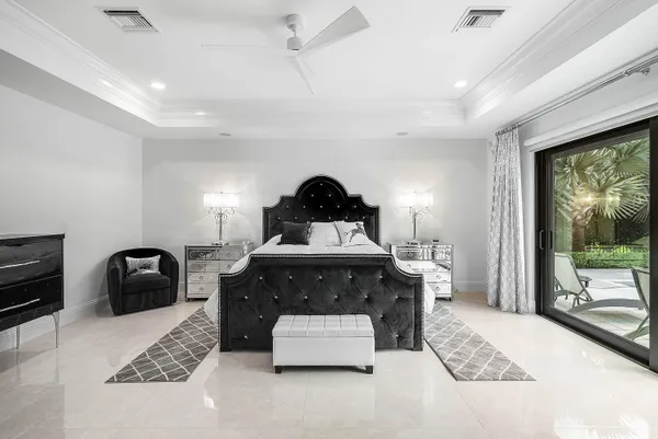 a living room with furniture fireplace and flat screen tv
