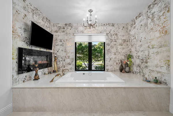 a bathroom with a double vanity sink mirror and
