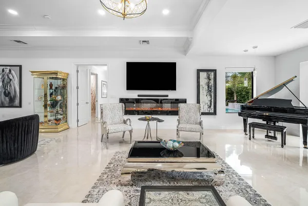 a living room with furniture and a table