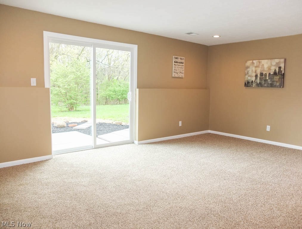 1475 Sand Run Road Akron, OH 44313 - Photo 8 of 24 Family room with slider to back patio.