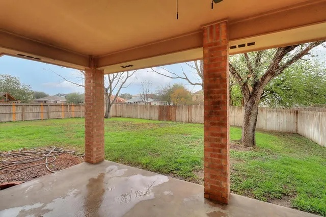 a view of a porch with a backyard