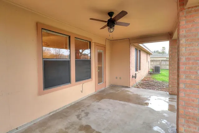 a view of a hallway with a window