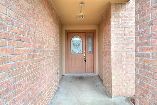 a view of a bathroom with a shower curtain