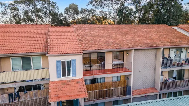 an aerial view of house with yard