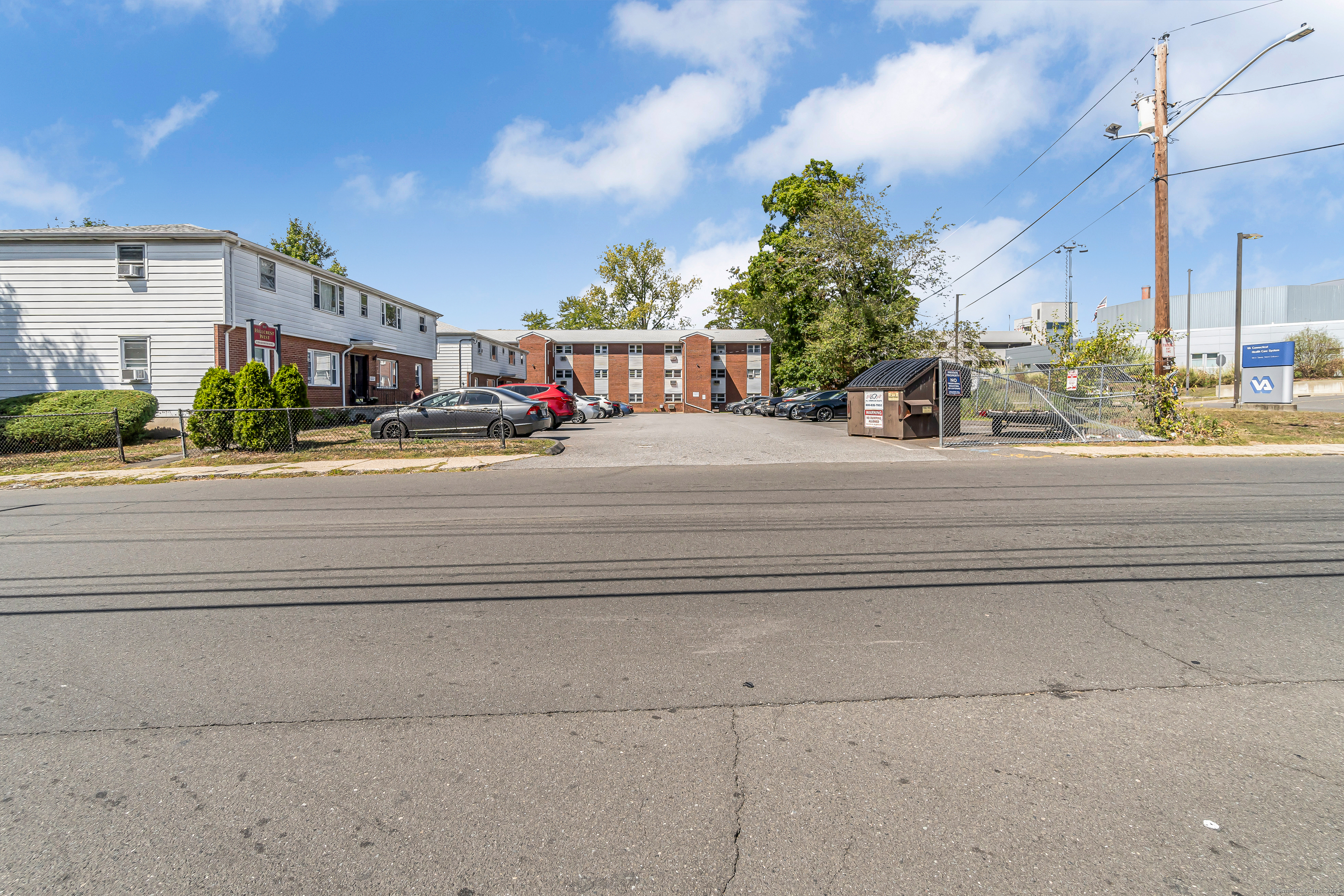 161 West Spring Street, Unit C1 West Haven, CT 06516 - Photo 2 of 14 a front view of a building with street