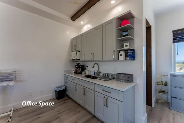 a front view of a house with large windows