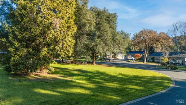 a view of a swimming pool with an outdoor space and seating area