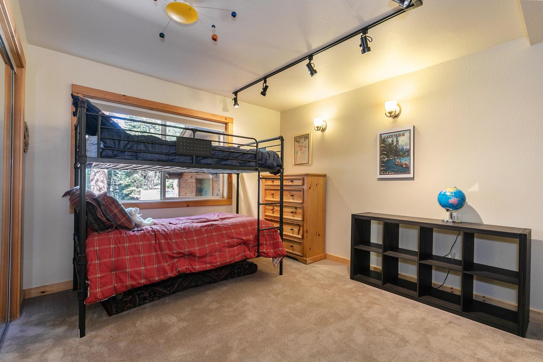 11325 Thelin Drive Truckee, CA 96161 - Photo 15 of 21 a bedroom with two beds and a window
