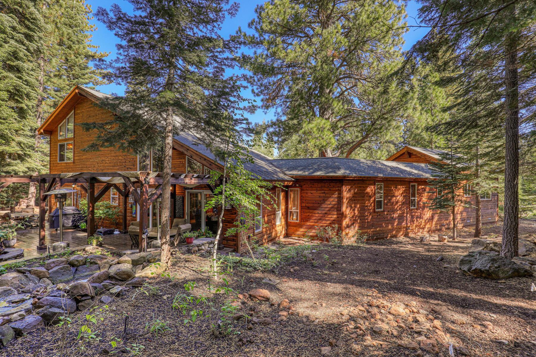 11325 Thelin Drive Truckee, CA 96161 - Photo 2 of 21 a view of a backyard with a tree