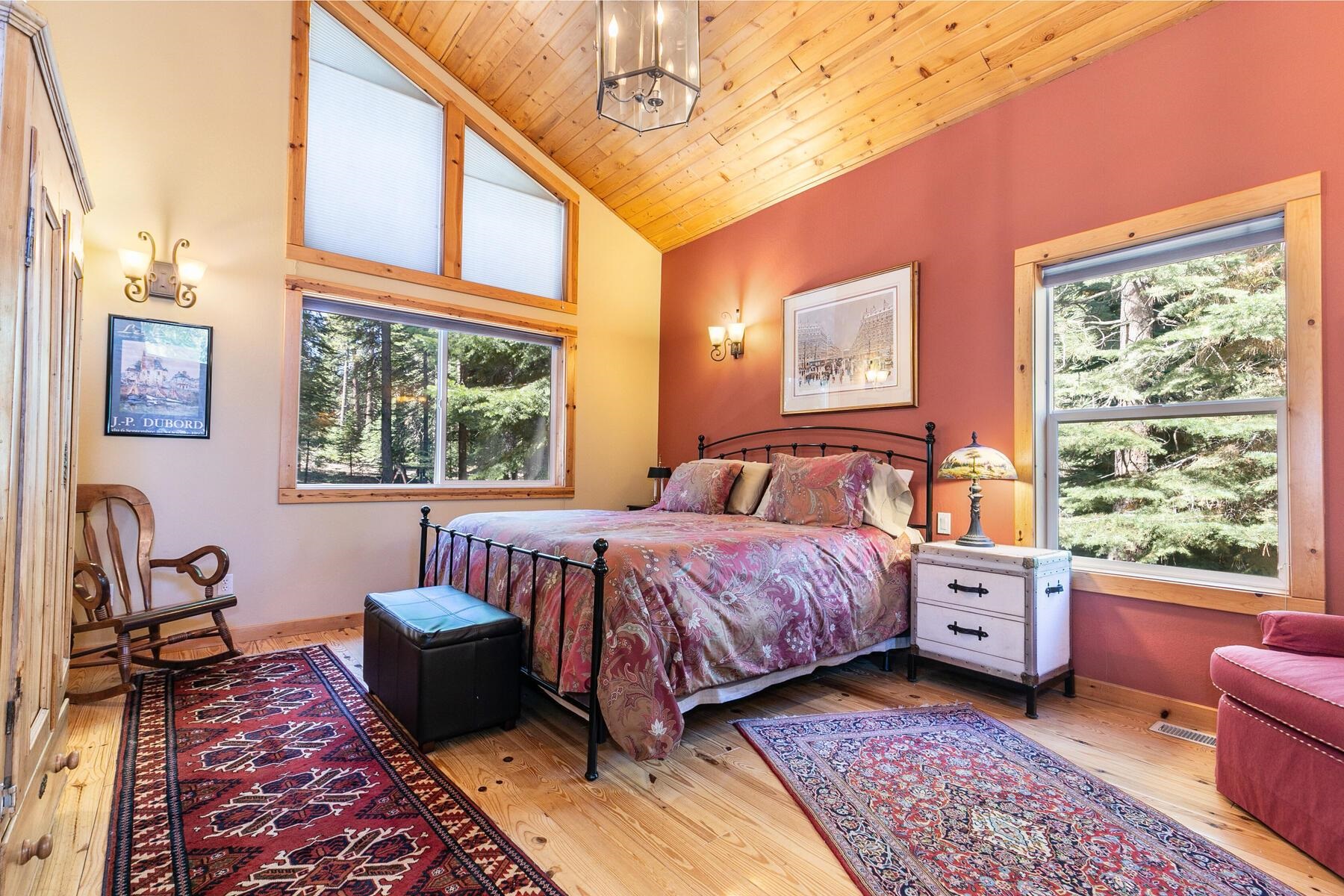 11325 Thelin Drive Truckee, CA 96161 - Photo 10 of 21 a bedroom with a bed and wooden floor