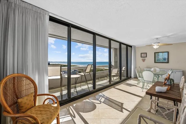 a kitchen with a sink a stove and a refrigerator