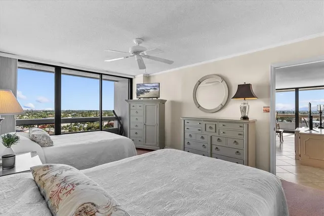 a bathroom with a toilet a sink and a mirror