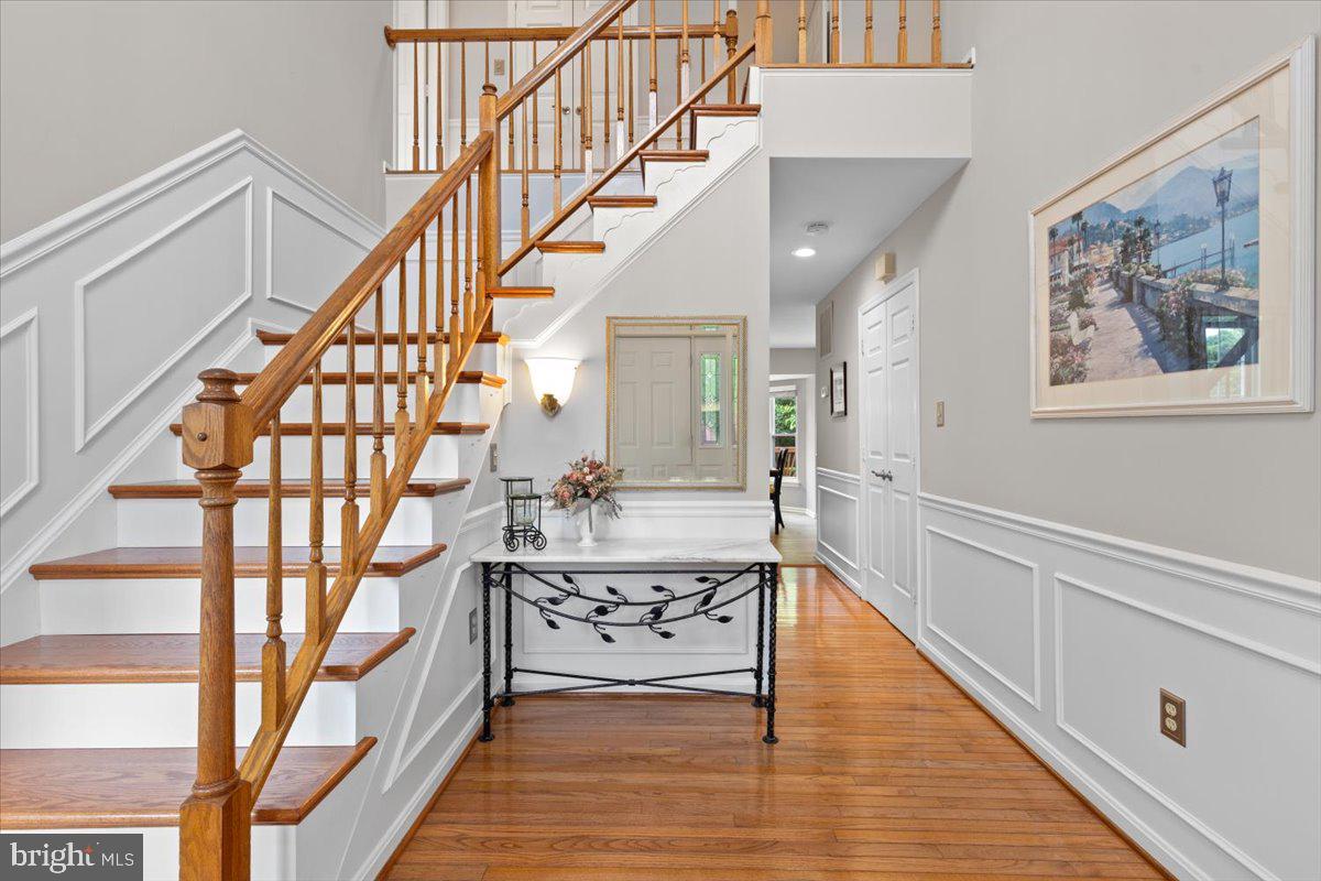 1587 Kingstream Circle Herndon, VA 20170 - Photo 7 of 65 Hardwood floors and wainscoting
