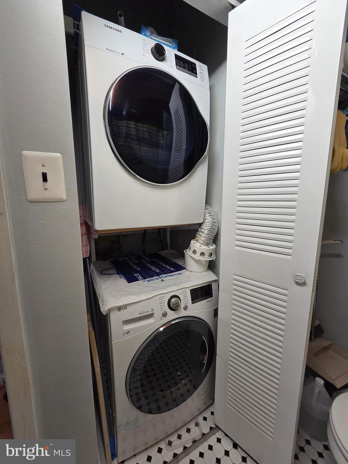 1010 Race Street, Unit 6LM Philadelphia, PA 19107 - Photo 18 of 25 a utility room with dryer and washer