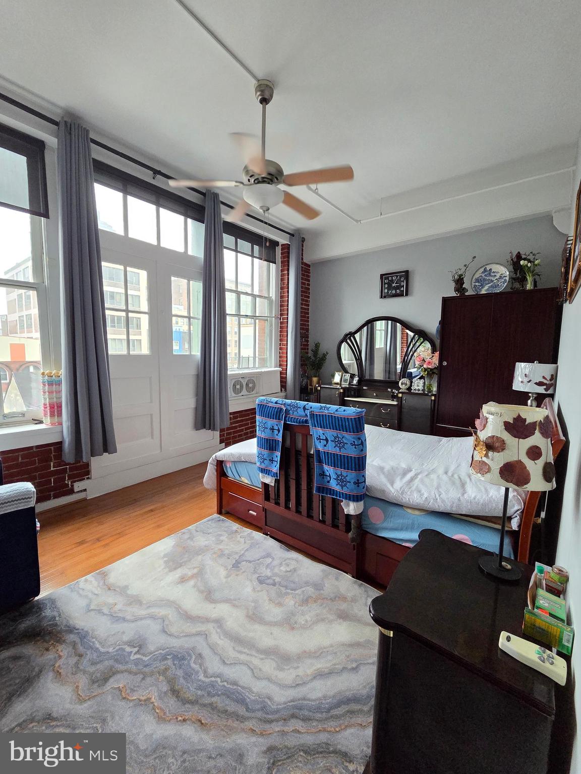 1010 Race Street, Unit 6LM Philadelphia, PA 19107 - Photo 19 of 25 a living room with furniture and a window