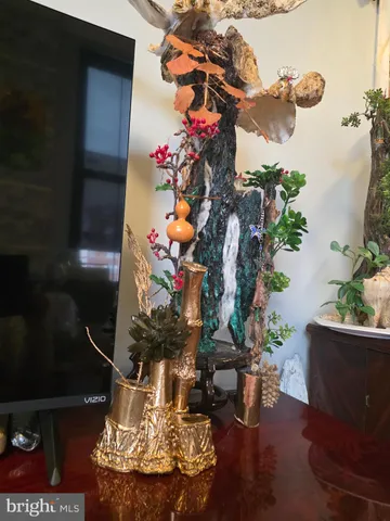 a vase of flowers sitting on a table