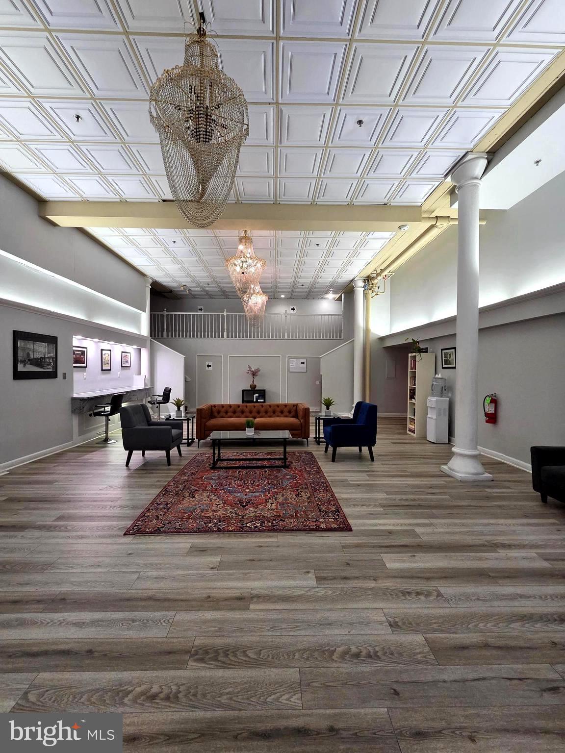 1010 Race Street, Unit 6LM Philadelphia, PA 19107 - Photo 3 of 25 a large room with lots of furniture and natural light