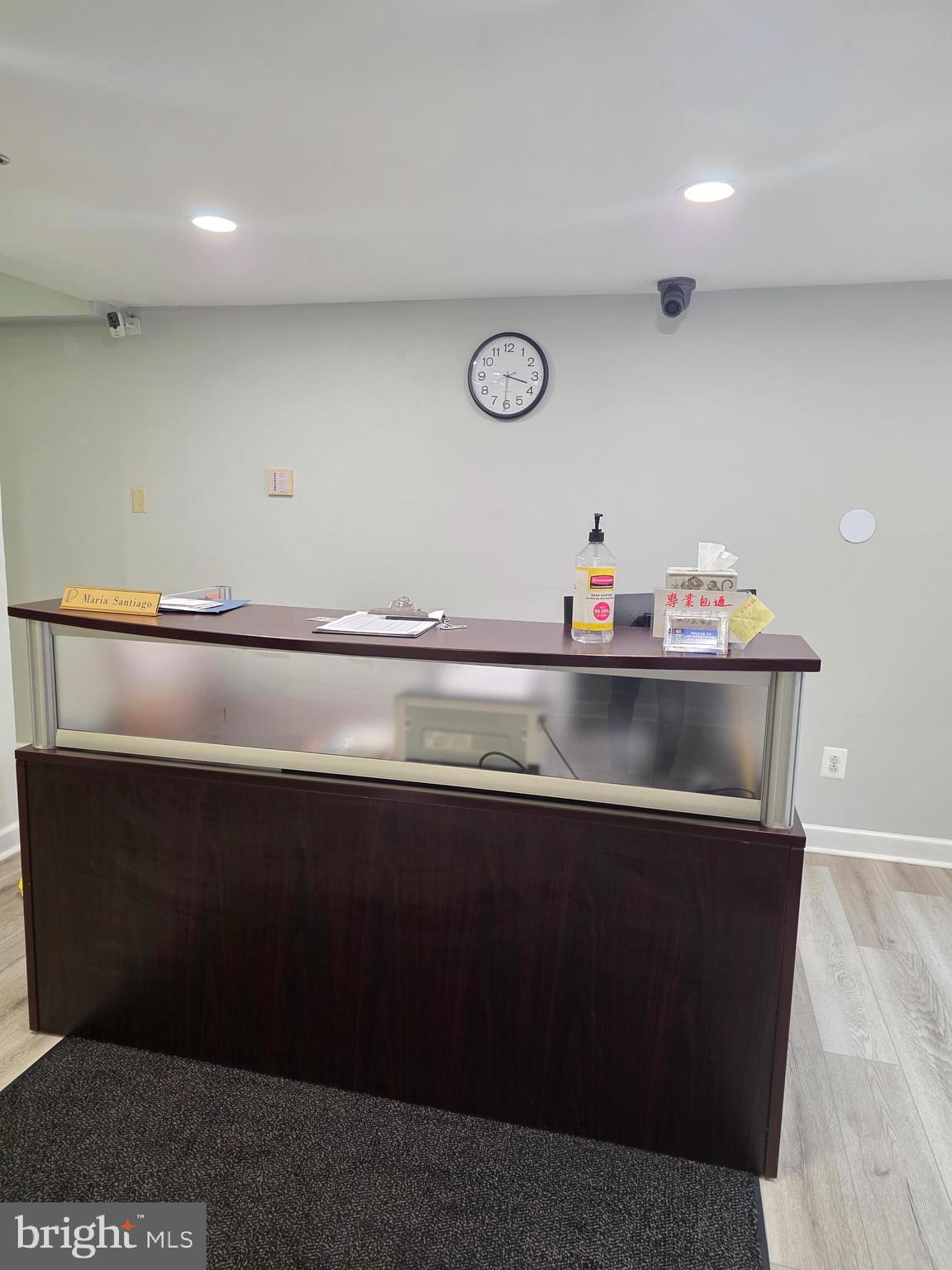 1010 Race Street, Unit 6LM Philadelphia, PA 19107 - Photo 8 of 25 a kitchen with kitchen island sink and cabinets