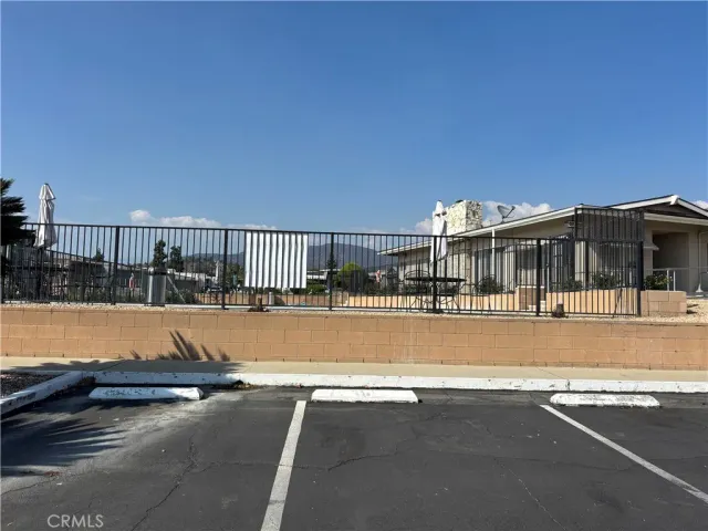 a view of swimming pool and a yard