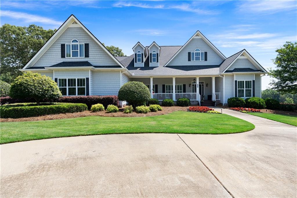 2028 Morgan Valley Road Rockmart, GA 30153 - Photo 1 of 1 a front view of a house with a yard