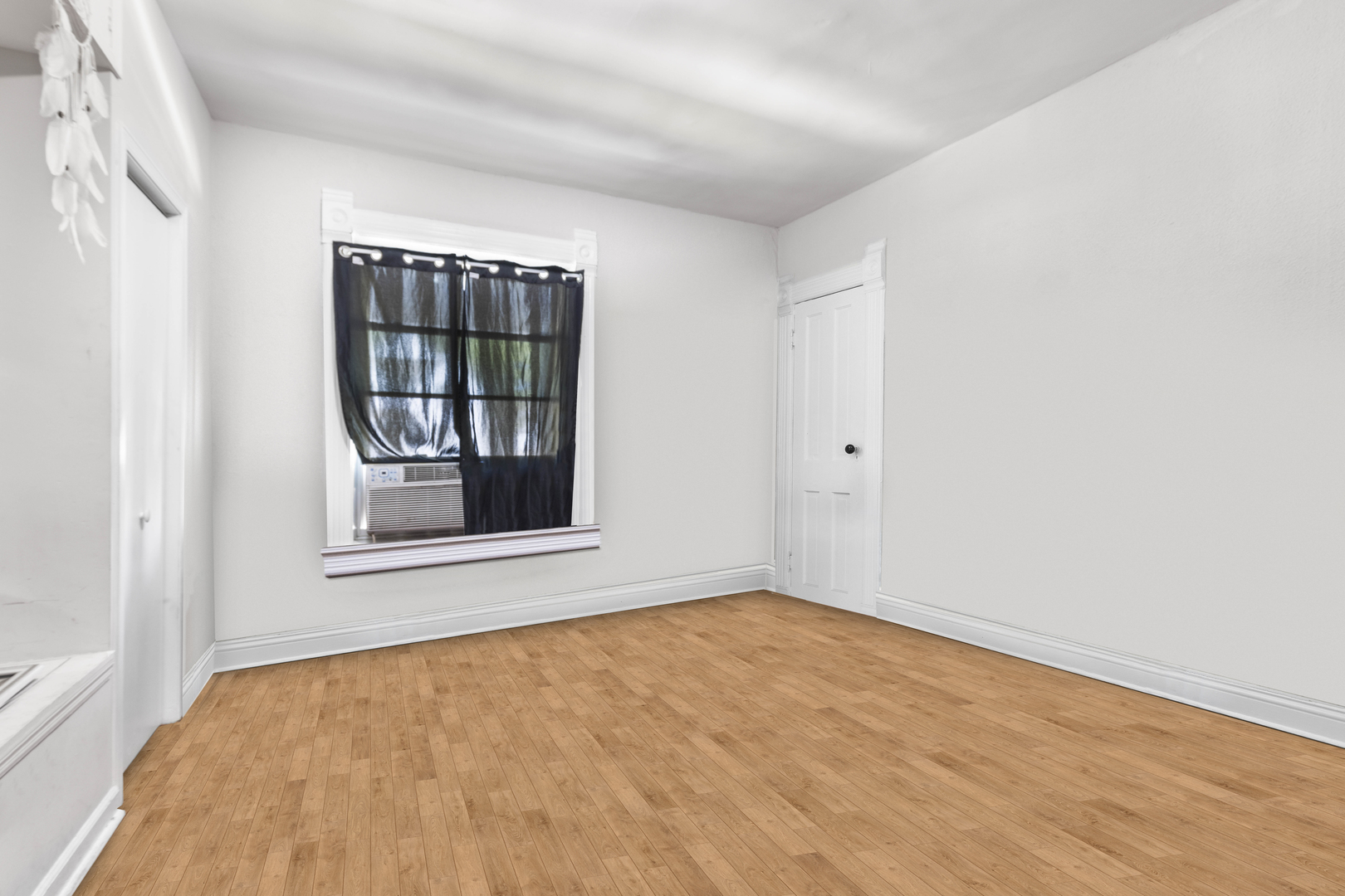 1710 7th Street Rockford, IL 61104 - Photo 10 of 13 a view of an empty room with a window