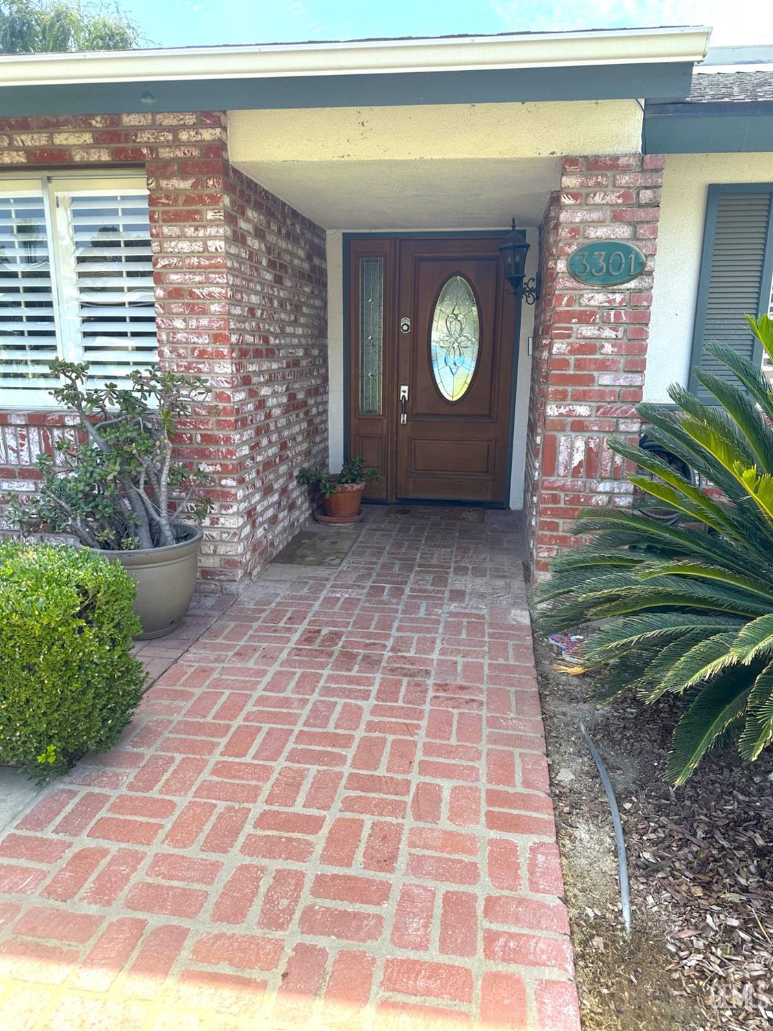 Undisclosed Address Bakersfield, CA 93306 - Photo 2 of 27 a front view of a house