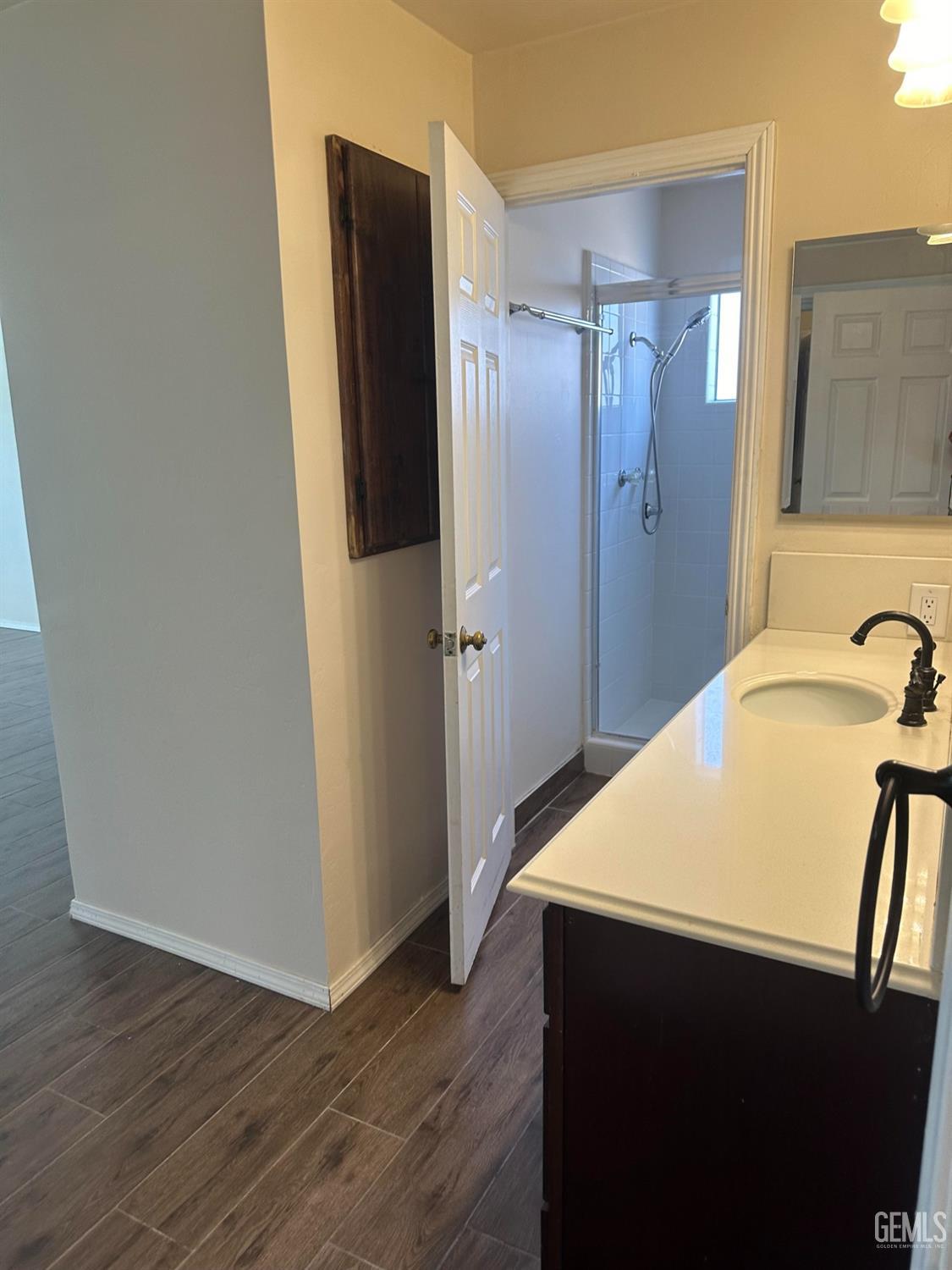 Undisclosed Address Bakersfield, CA 93306 - Photo 10 of 27 a view of bathroom with a sink and mirror