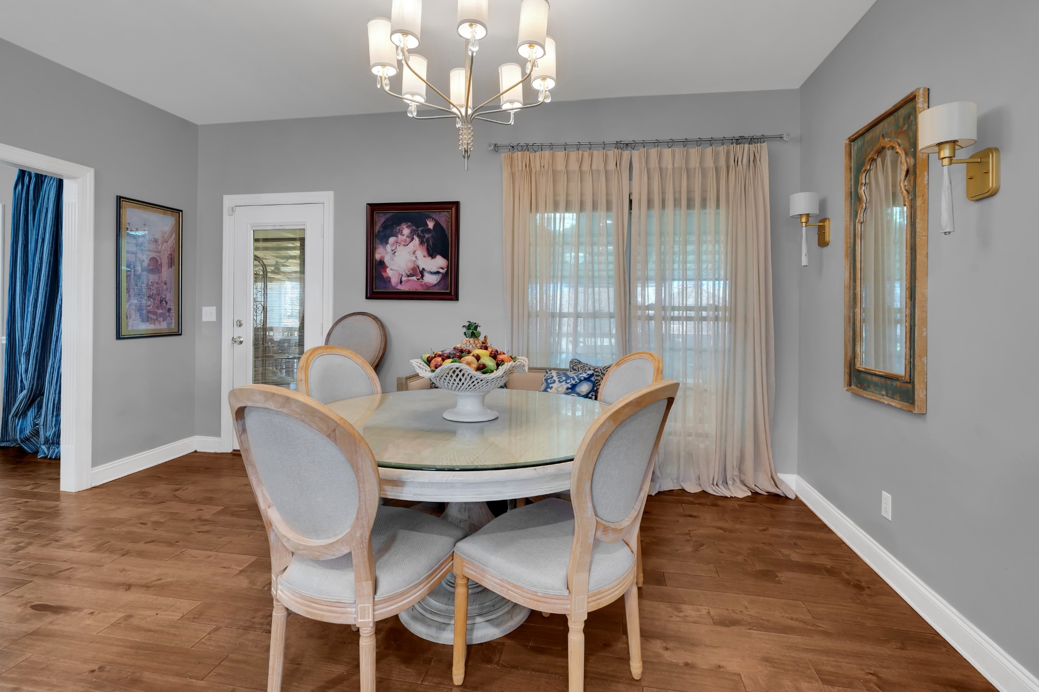 1191 Knights Church Road Decherd, TN 37324 - Photo 12 of 58 a dining room with furniture a chandelier and wooden floor