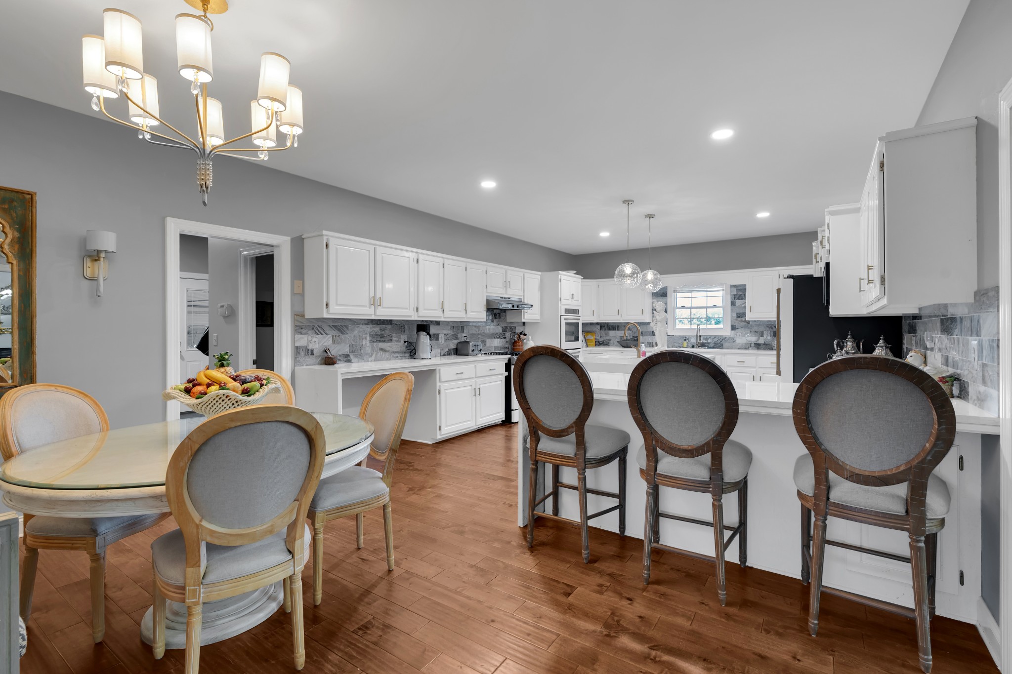 1191 Knights Church Road Decherd, TN 37324 - Photo 13 of 58 a kitchen with sink a dining table and chairs
