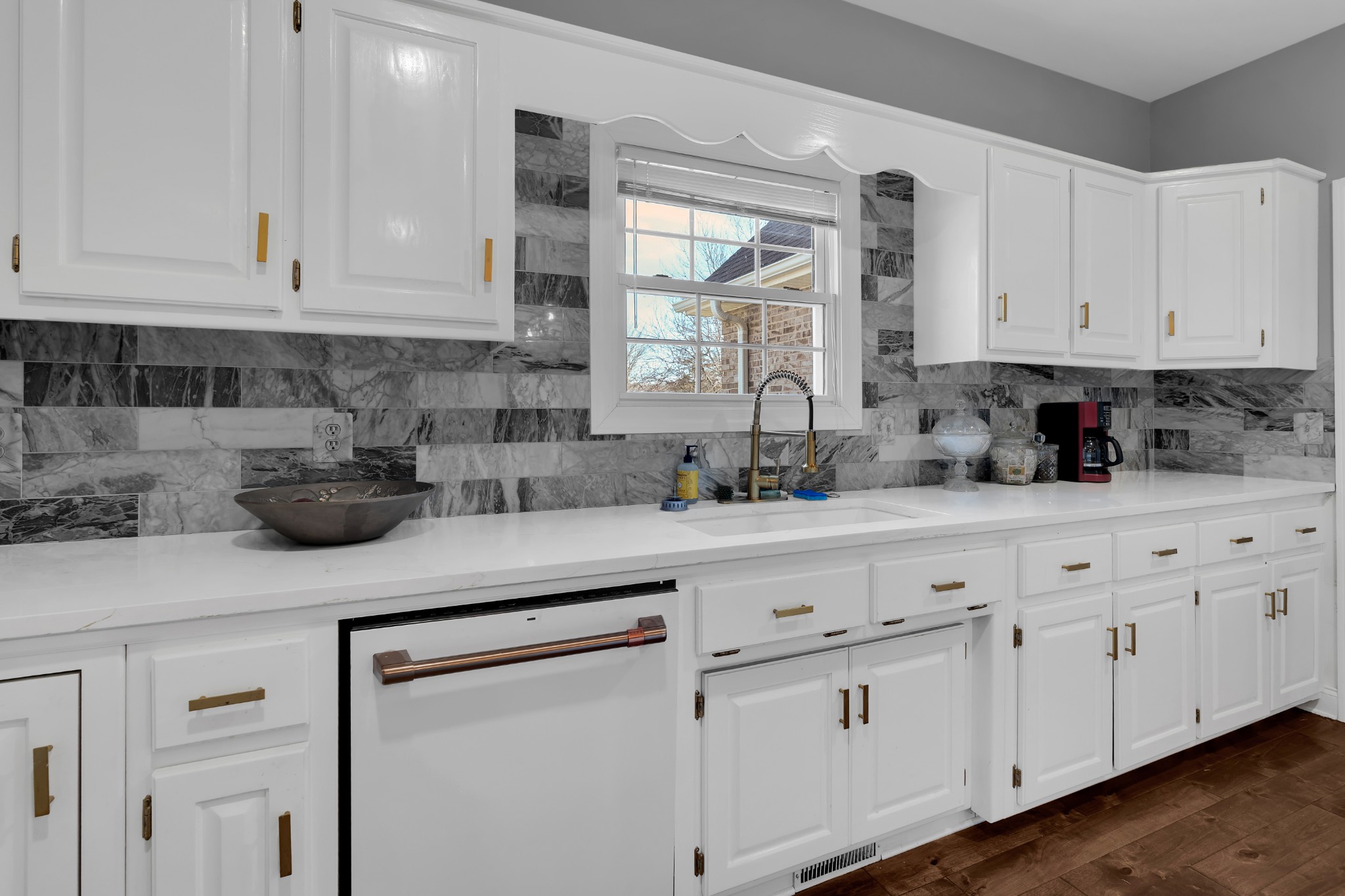 1191 Knights Church Road Decherd, TN 37324 - Photo 18 of 58 a kitchen with white cabinets and a sink
