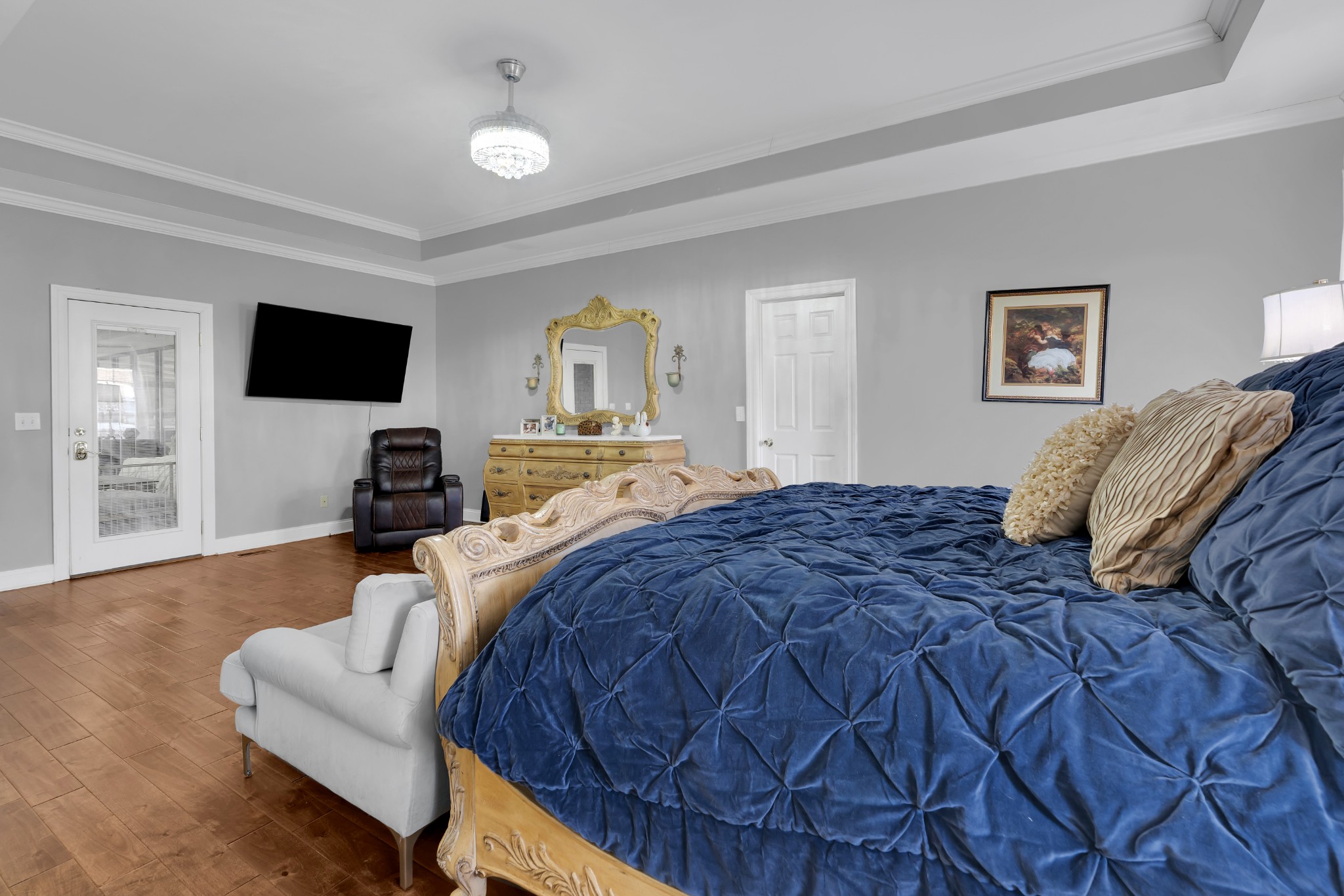 1191 Knights Church Road Decherd, TN 37324 - Photo 23 of 58 a bedroom with a bed and a flat screen tv