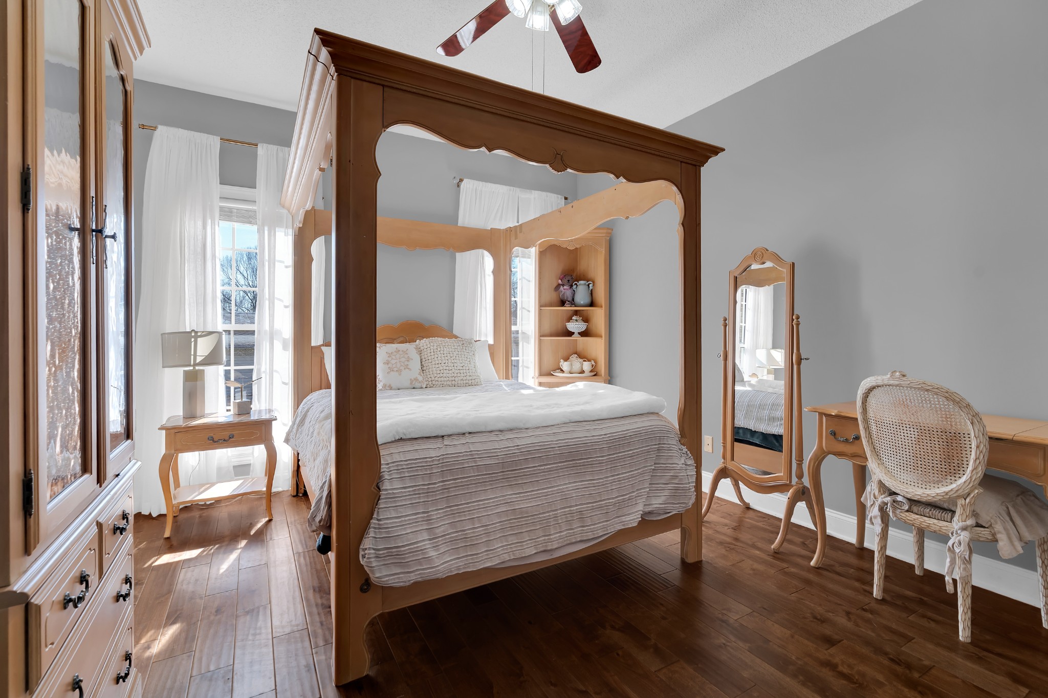 1191 Knights Church Road Decherd, TN 37324 - Photo 28 of 58 a bedroom with a bed window and a chandelier