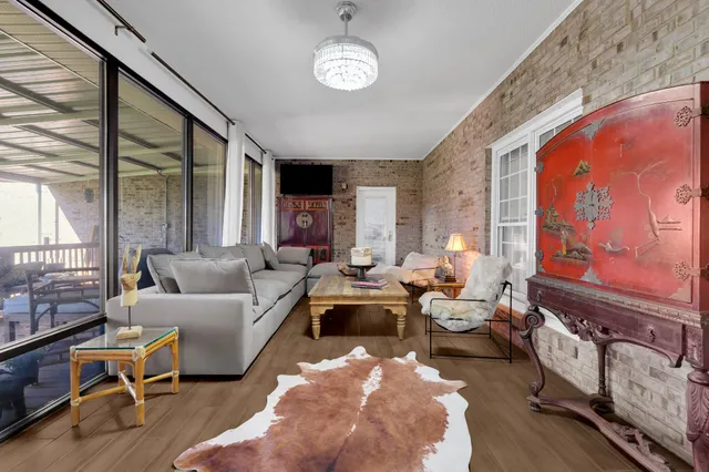 a view of a balcony with furniture