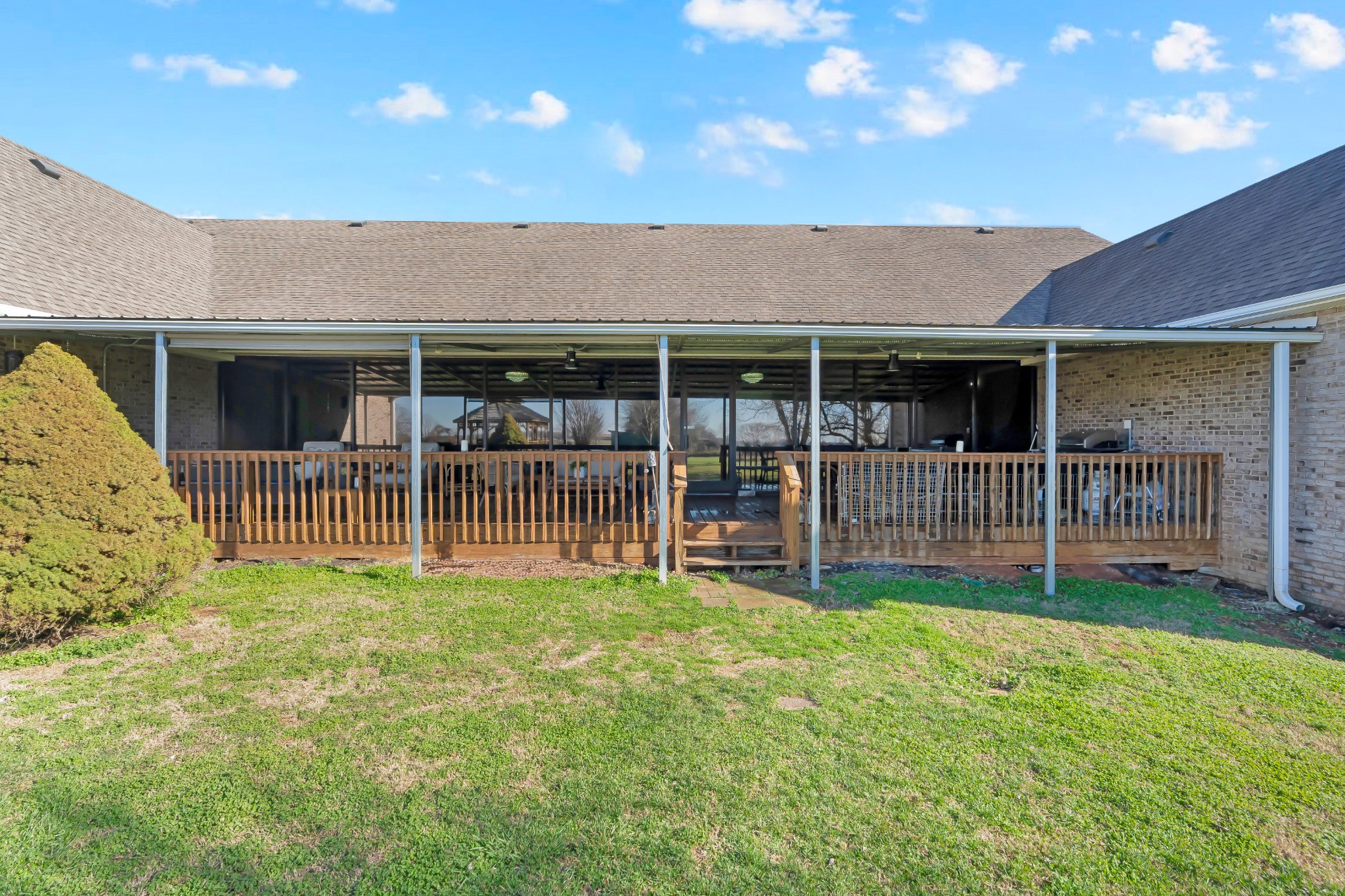 1191 Knights Church Road Decherd, TN 37324 - Photo 42 of 58 a backyard of a house with table and chairs