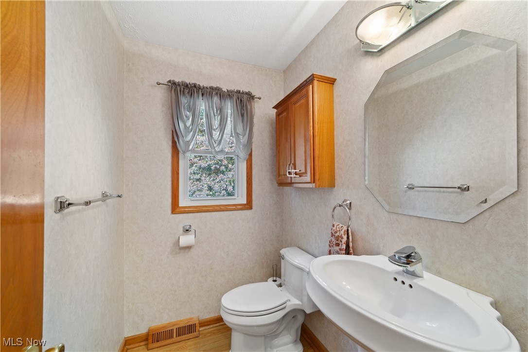 3694 Nichols Road Medina, OH 44256 - Photo 14 of 47 Bathroom with toilet and wood finished floors