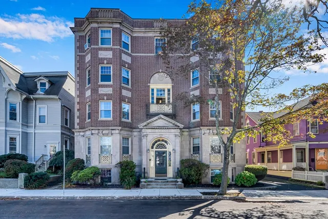 a front view of a multi story residential apartment building