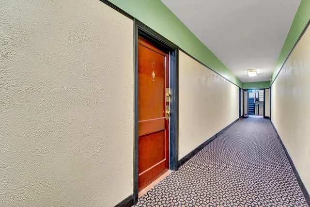 a view of hallway with stairs