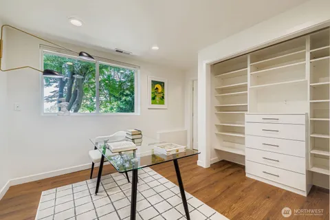a view of room with furniture and window