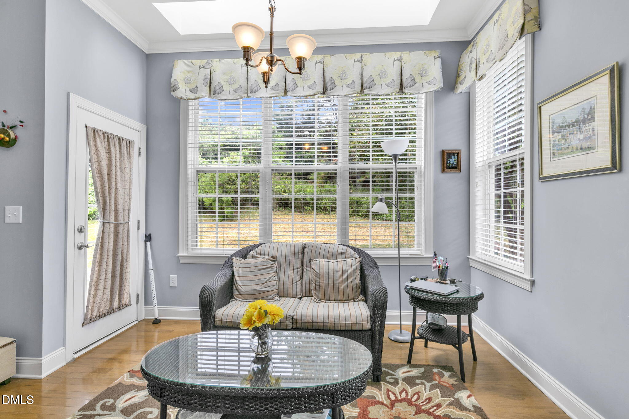 9805 Carlyle Hills Way Raleigh, NC 27560 - Photo 15 of 42 a living room with furniture and a table