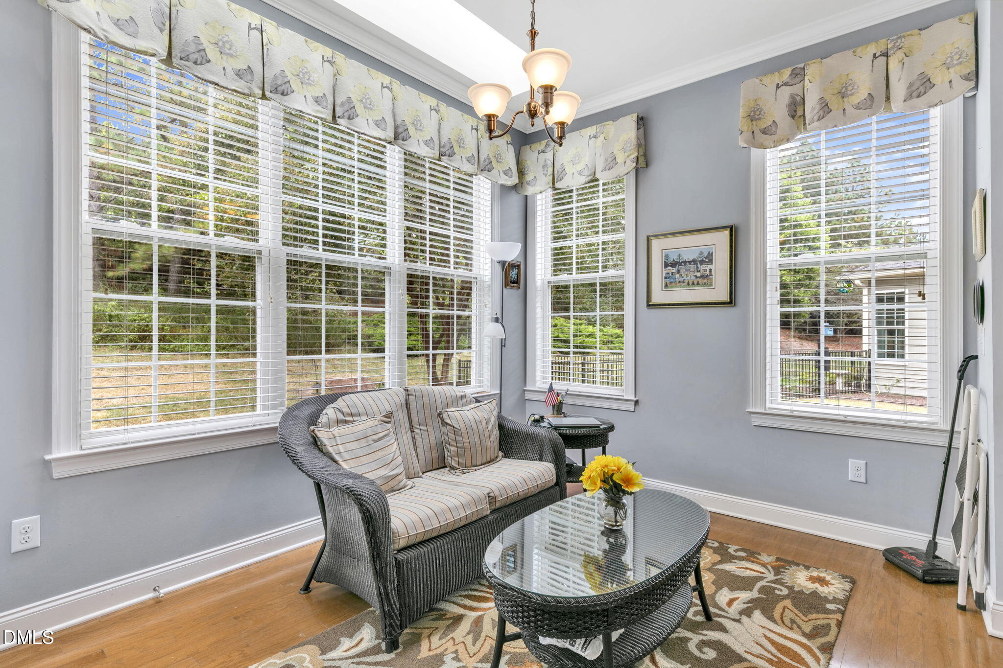9805 Carlyle Hills Way Raleigh, NC 27560 - Photo 16 of 42 a living room with furniture and a window
