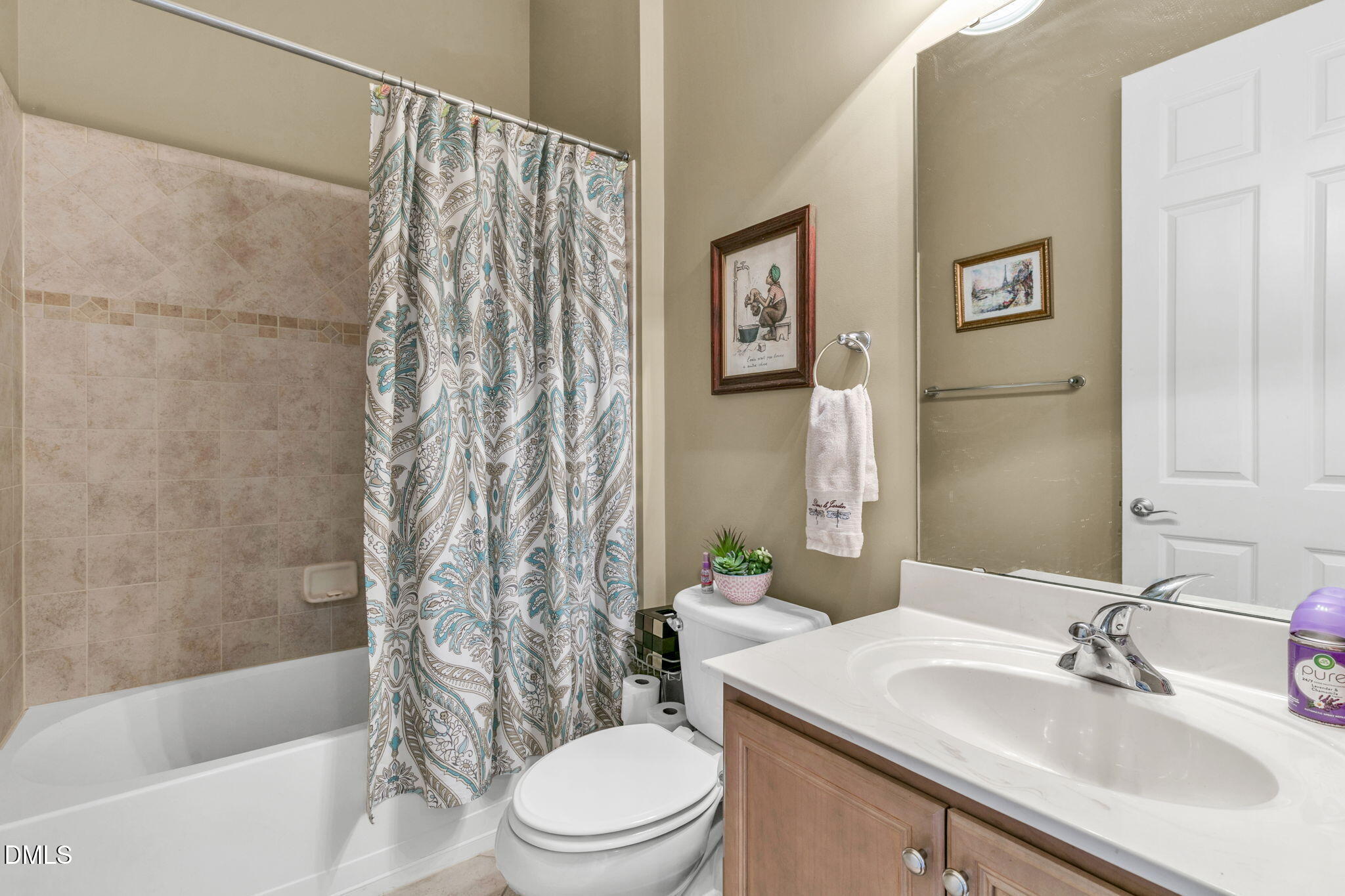 9805 Carlyle Hills Way Raleigh, NC 27560 - Photo 33 of 42 a bathroom with a sink a toilet and shower