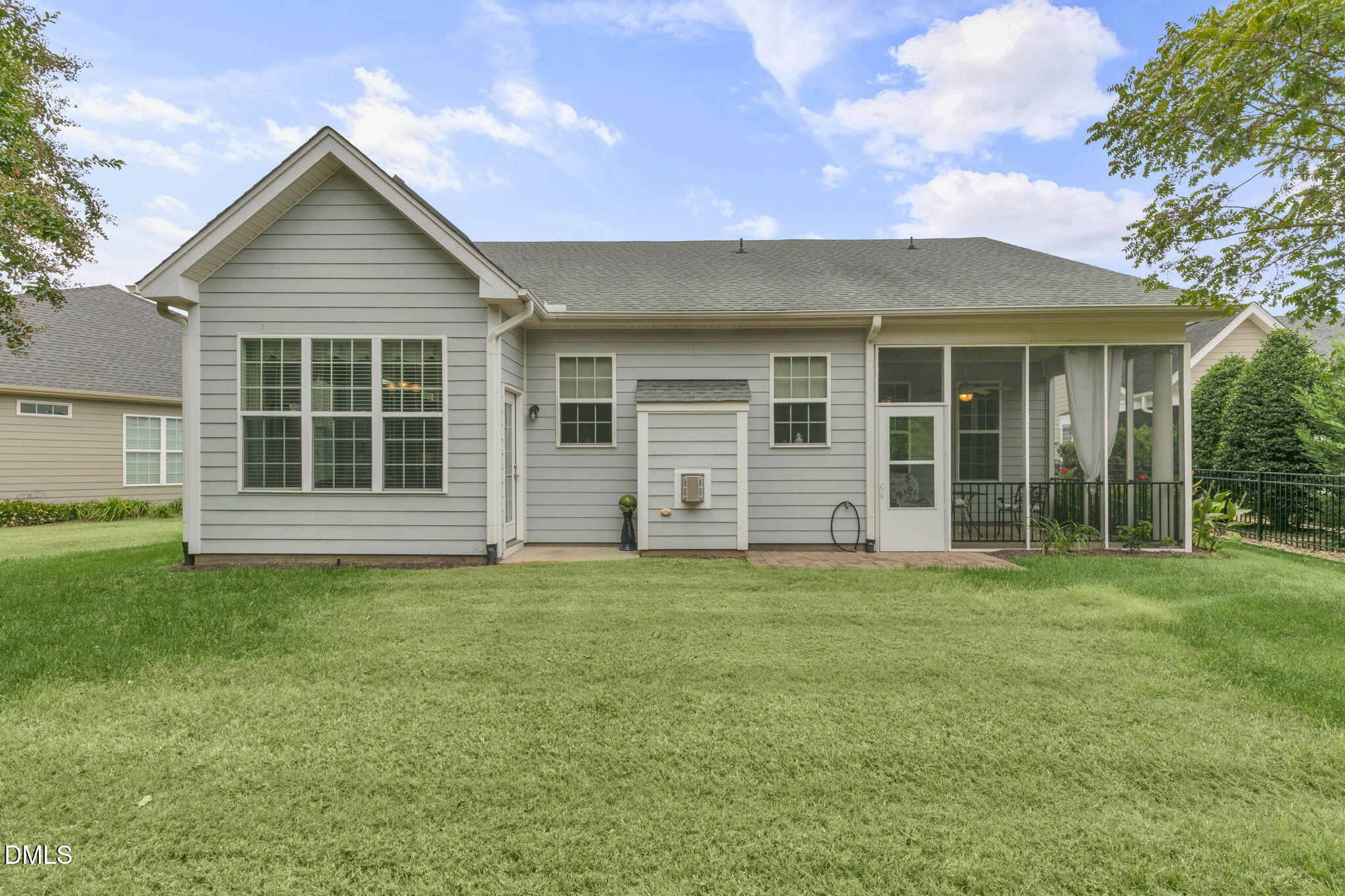 9805 Carlyle Hills Way Raleigh, NC 27560 - Photo 41 of 42 a view of a house with a yard