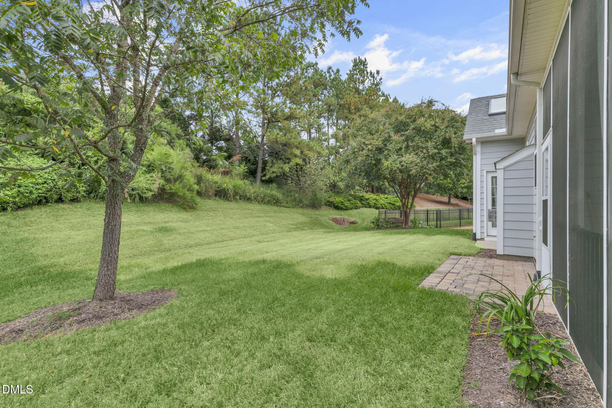 9805 Carlyle Hills Way Raleigh, NC 27560 - Photo 42 of 42 a view of a garden with a tree