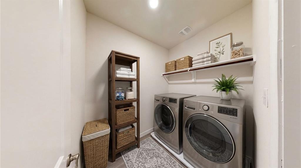 2045 Juniper Pass Way Mesquite, TX 75149 - Photo 12 of 15 a view of a bedroom with washer and dryer