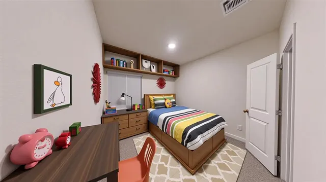a bedroom with bed and wooden floor