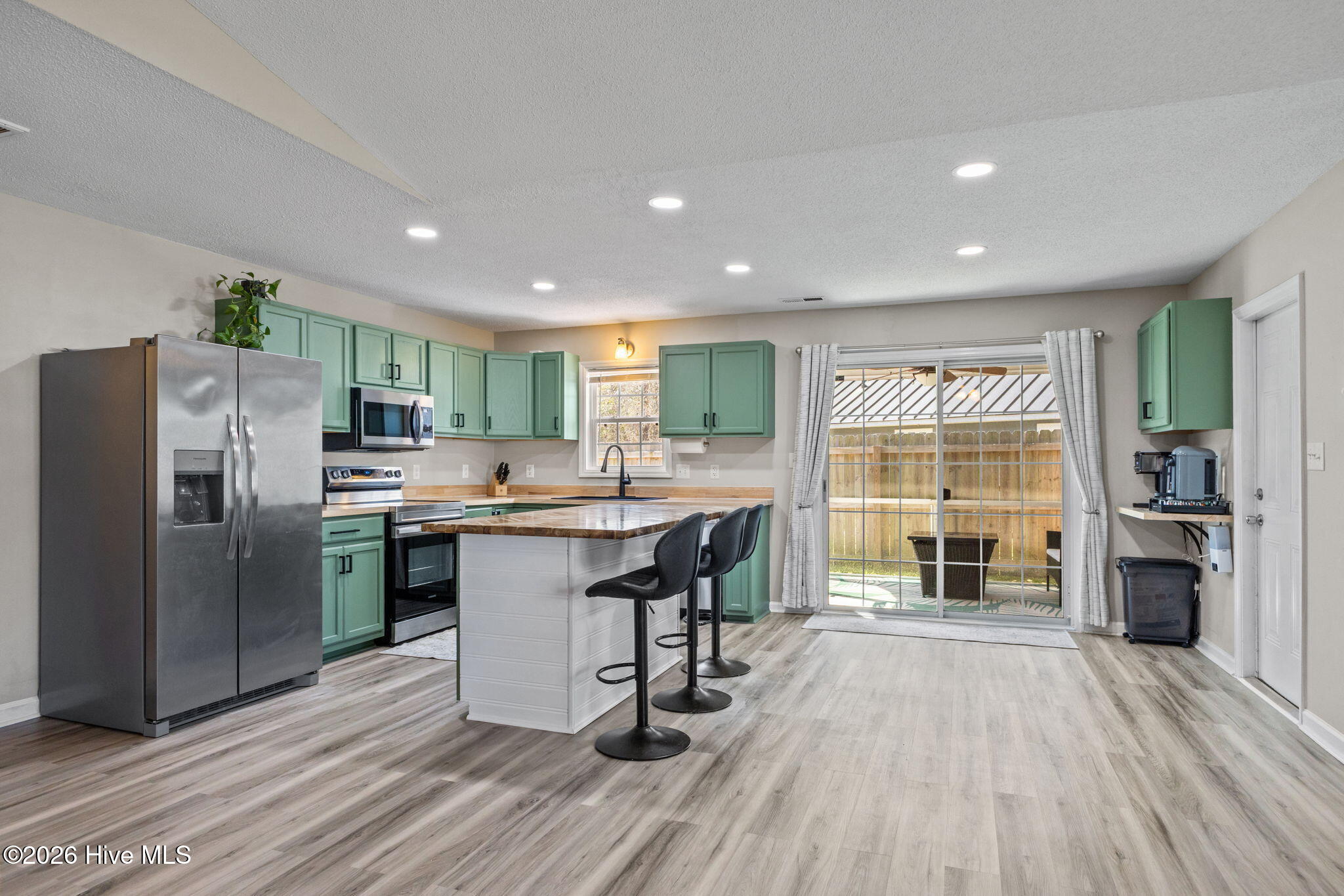 229 Gray Fox Run Hubert, NC 28539 - Photo 15 of 33 Kitchen looking out to screened porch