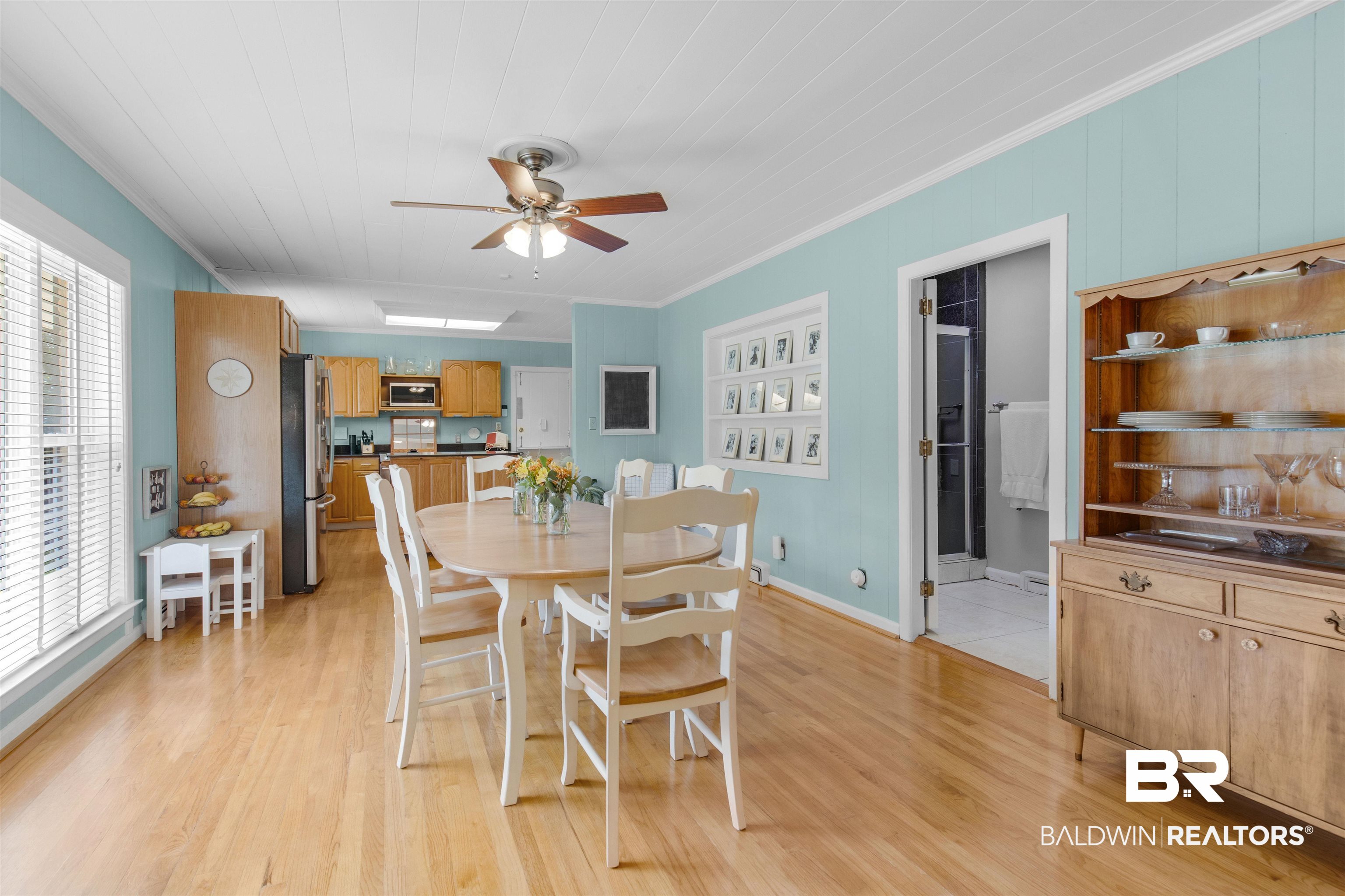 4306 Michael Boulevard Mobile, AL 36609 - Photo 3 of 35 Dining area with light wood-type flooring, crown molding, and ceiling fan