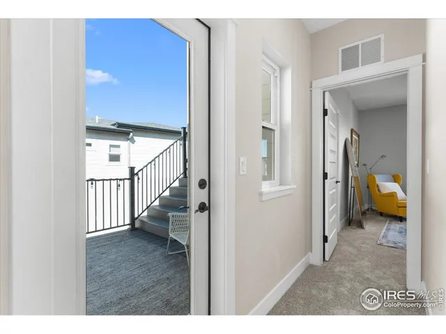 a view of entryway and hall with a view
